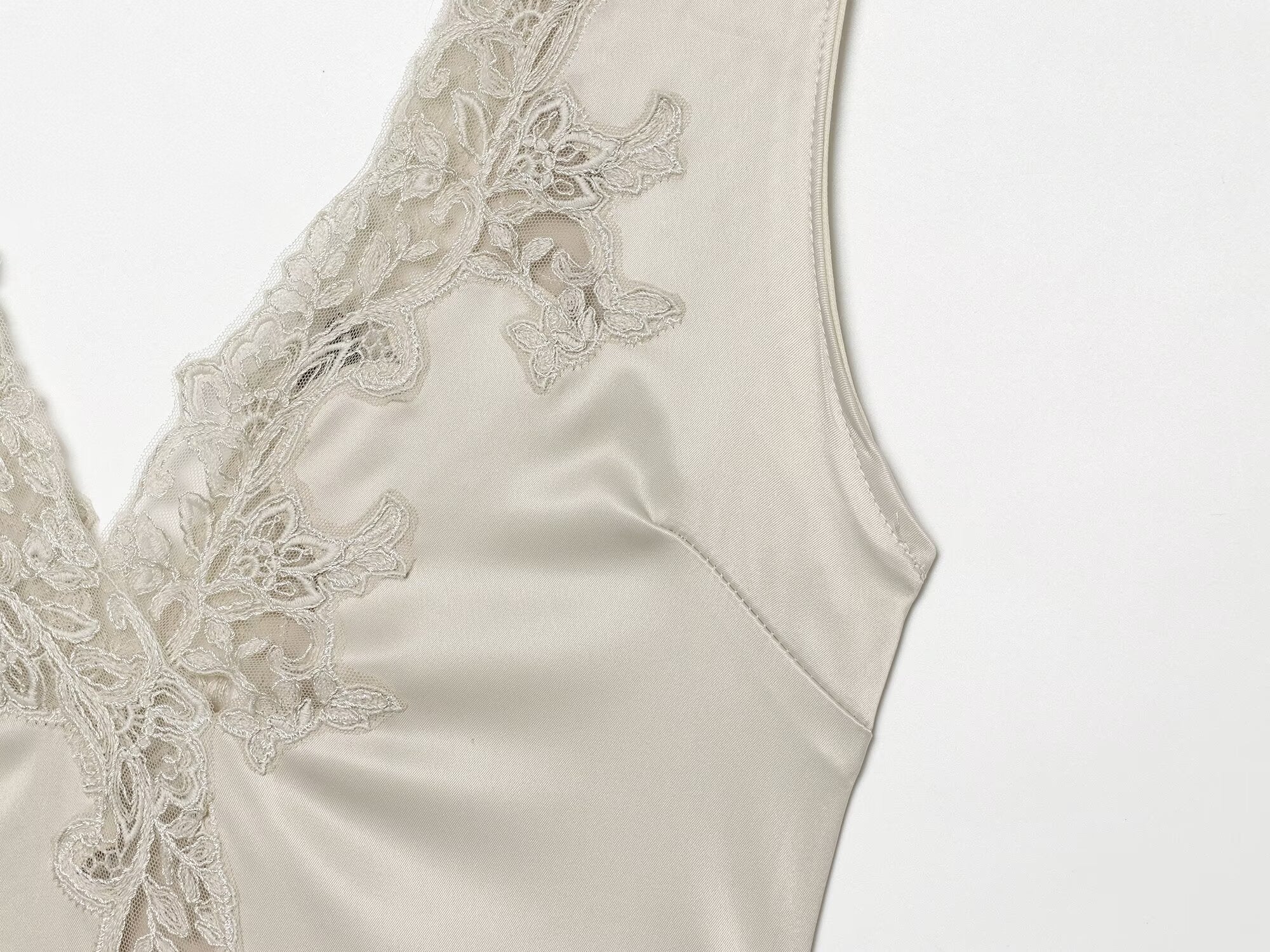 Women's lace decorated satin textured bodysuit